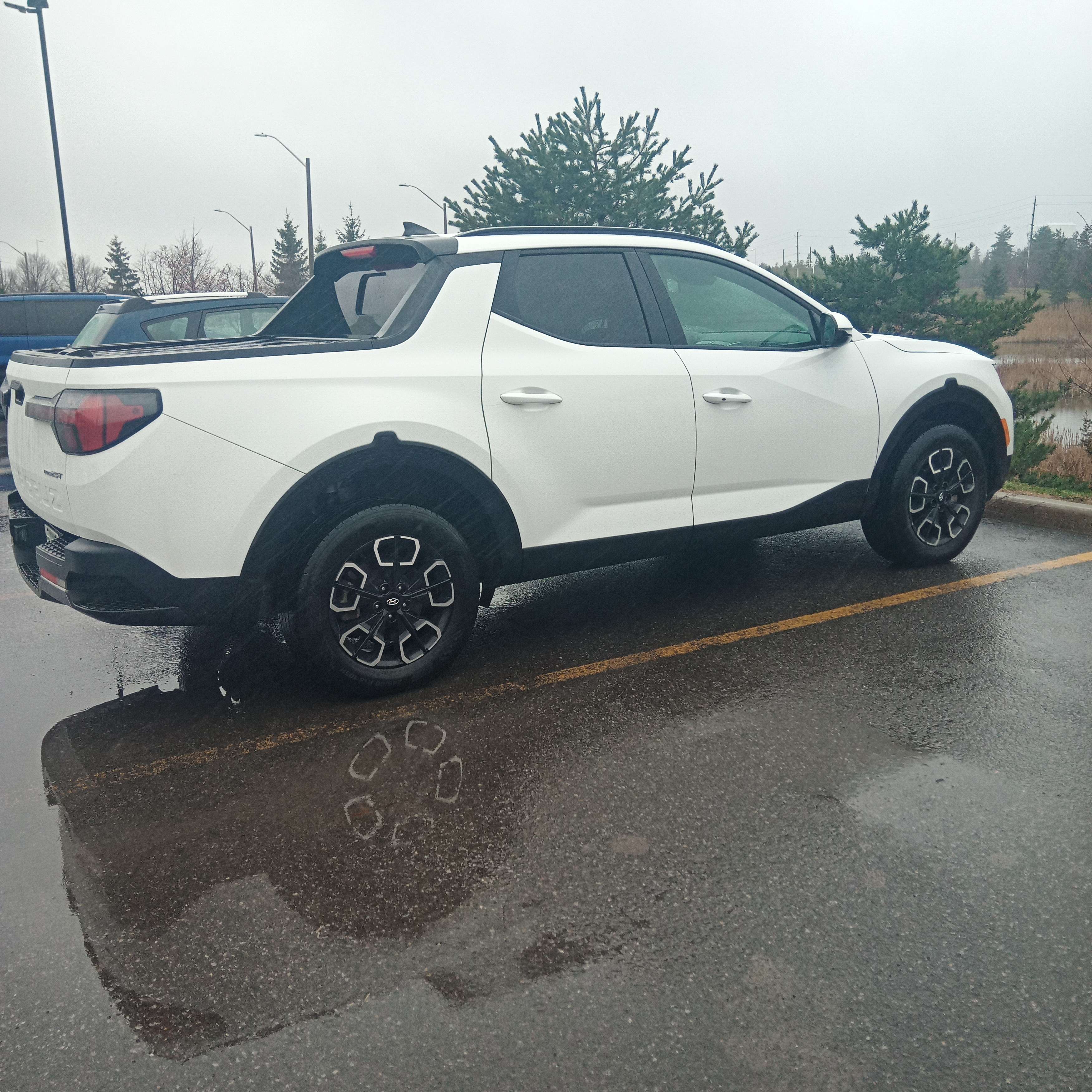 A big ugly half-pickup truck thing