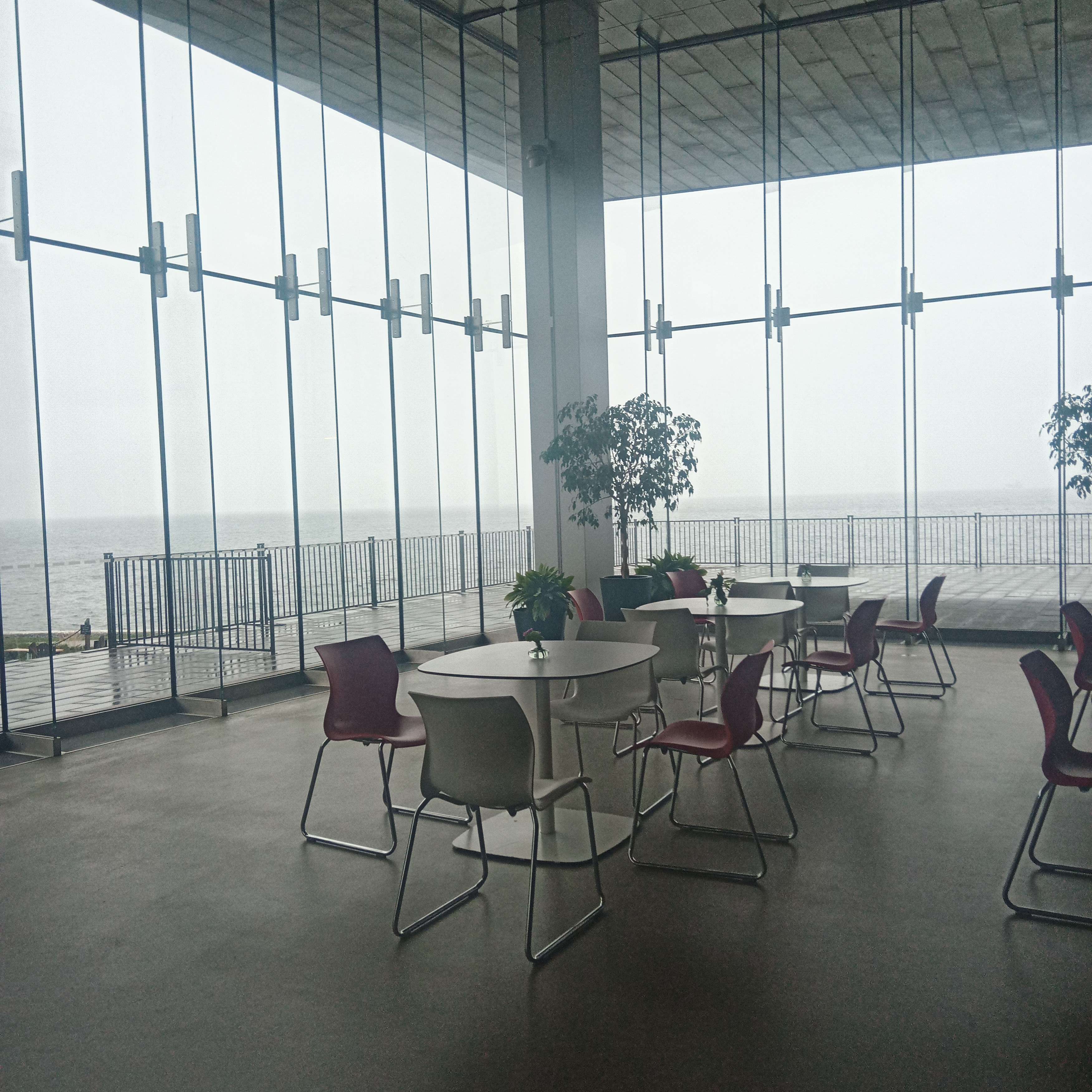 Shoreline through window of lobby